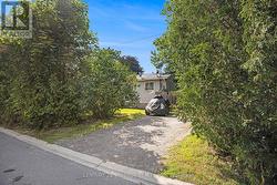Unit 2: private driveway on Ferrill Crescent. - 