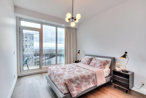 Chambre à coucher principale - 2004-255 Rue Étienne-Lavoie, Laval (Sainte-Dorothée), QC - Indoor Photo Showing Bedroom