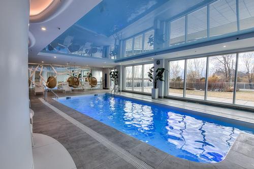Piscine - 2004-255 Rue Étienne-Lavoie, Laval (Sainte-Dorothée), QC - Indoor Photo Showing Other Room With In Ground Pool
