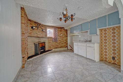 Vue d'ensemble - 8913  - 15 2E Avenue, Montréal (Villeray/Saint-Michel/Parc-Extension), QC - Indoor With Fireplace