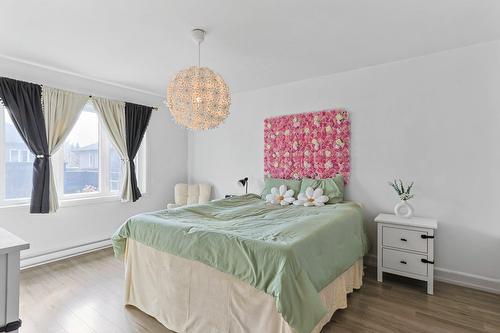 Chambre à coucher principale - 123 Rue Des Récoltes, Sainte-Barbe, QC - Indoor Photo Showing Bedroom