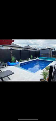 Piscine - 123 Rue Des Récoltes, Sainte-Barbe, QC - Outdoor With Backyard