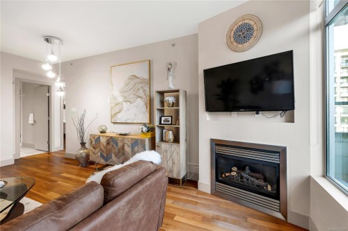 S1104-737 Humboldt St, Victoria, BC - Indoor Photo Showing Living Room With Fireplace