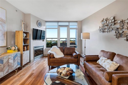S1104-737 Humboldt St, Victoria, BC - Indoor Photo Showing Living Room With Fireplace