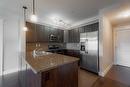 504-975 Victoria  W Street, Kamloops, BC  - Indoor Photo Showing Kitchen With Double Sink 