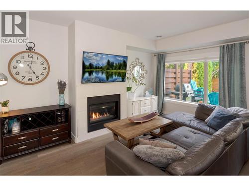 3350 Woodsdale Road Unit# 703, Lake Country, BC - Indoor Photo Showing Living Room With Fireplace