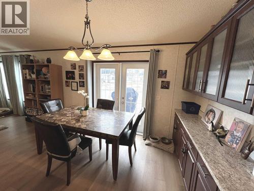 5506 Pine Crescent, Fort Nelson, BC - Indoor Photo Showing Dining Room