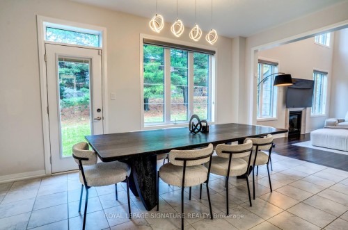 99 Bethpage Crescent, Newmarket, ON - Indoor Photo Showing Dining Room With Fireplace