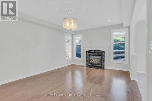 198 Jessie Caverhill Pass, Oakville, ON - Indoor Photo Showing Living Room With Fireplace