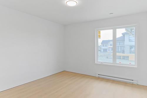 Chambre à coucher principale - 133 Rue Des Marronniers, Salaberry-De-Valleyfield, QC - Indoor Photo Showing Other Room