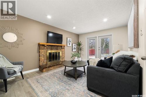 2003 Styles Crescent, Regina, SK - Indoor Photo Showing Living Room With Fireplace