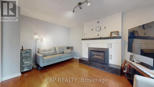 Sitting room with fireplace - 4 Trillium Crescent, Barrie, ON - Indoor Photo Showing Living Room With Fireplace