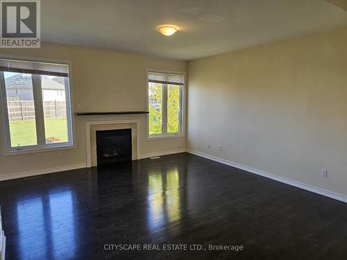 Living - 6366 Dilalla Crescent, Niagara Falls, ON - Indoor With Fireplace
