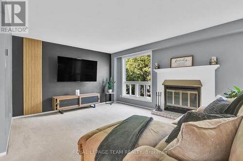 140 Centrepointe Drive, Ottawa, ON - Indoor Photo Showing Living Room With Fireplace