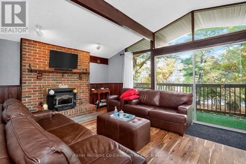 1950 Champlain Road, Tiny, ON - Indoor Photo Showing Living Room With Fireplace