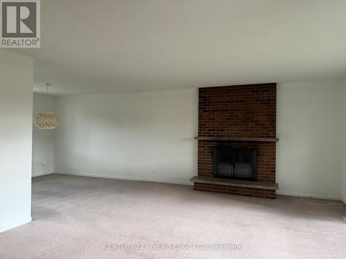 1154 Road 2 Road, Elizabethtown-Kitley, ON - Indoor Photo Showing Living Room With Fireplace