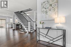 Stairs with wood finished floors and a textured ceiling - 