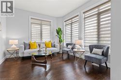 Living area with dark wood finished floors - 