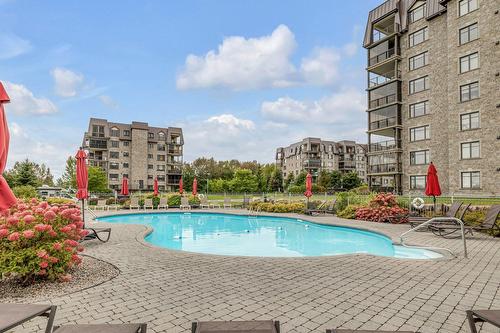 Pool - 705-7755 Rue Du Daim, Québec (Charlesbourg), QC - Outdoor With In Ground Pool