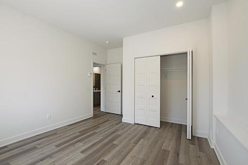 Chambre à coucher - 3173A Rue Roger, Sainte-Marthe-Sur-Le-Lac, QC - Indoor Photo Showing Other Room