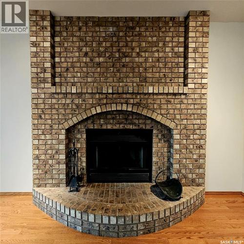 515 Grant Bay, Esterhazy, SK - Indoor Photo Showing Living Room With Fireplace