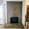 515 Grant Bay, Esterhazy, SK  - Indoor Photo Showing Living Room With Fireplace 