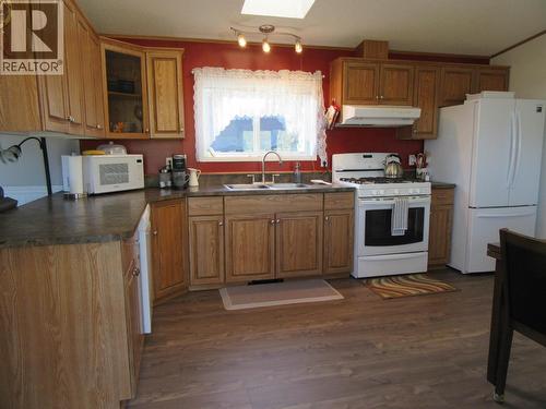 6064 Norman Road, 100 Mile House, BC - Indoor Photo Showing Kitchen With Double Sink