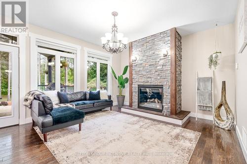 7070 93 Highway, Tiny, ON - Indoor Photo Showing Living Room With Fireplace