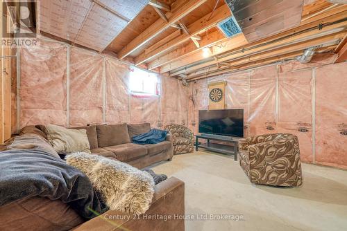11 Talon Drive, Woodstock (Woodstock - South), ON - Indoor Photo Showing Basement With Fireplace