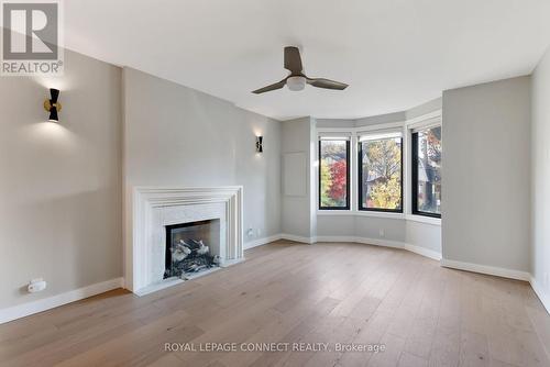 16 Rosemount Avenue, Toronto, ON - Indoor Photo Showing Living Room With Fireplace