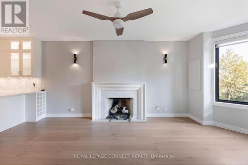 16 Rosemount Avenue, Toronto, ON - Indoor Photo Showing Living Room With Fireplace
