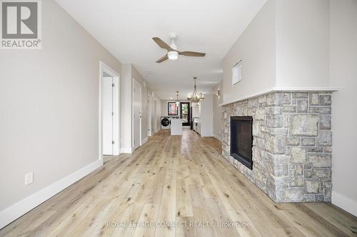 16 Rosemount Avenue, Toronto, ON - Indoor Photo Showing Other Room With Fireplace