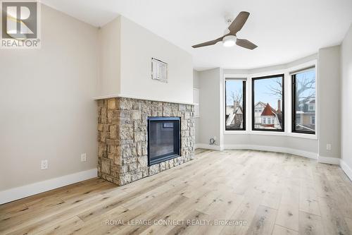 16 Rosemount Avenue, Toronto, ON - Indoor Photo Showing Living Room With Fireplace