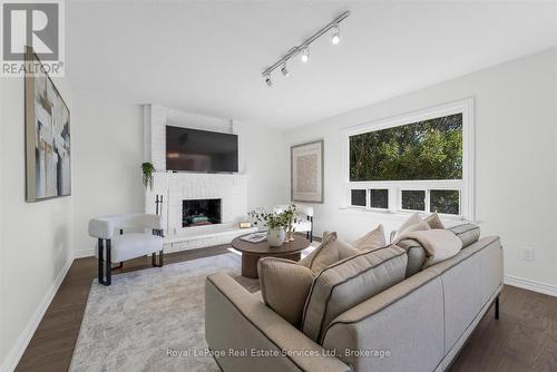 2938 Mulberry Drive, Oakville (Cv Clearview), ON - Indoor Photo Showing Living Room With Fireplace