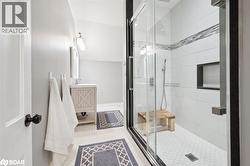 Full bathroom with vanity and a shower stall - 