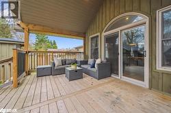 Wooden deck with outdoor lounge area - 