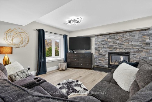74 Green Mountain Road E, Hamilton, ON - Indoor Photo Showing Living Room With Fireplace