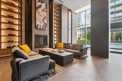 3703-55 Charles Street E, Toronto, ON - Indoor Photo Showing Living Room With Fireplace