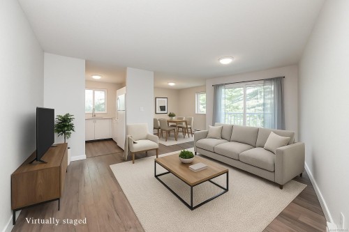 409-1050 Braidwood Rd, Courtenay, BC - Indoor Photo Showing Living Room