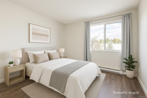409-1050 Braidwood Rd, Courtenay, BC - Indoor Photo Showing Bedroom