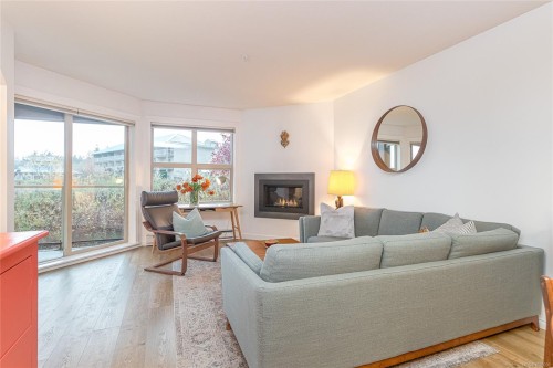 111-4949 Wills Rd, Nanaimo, BC - Indoor Photo Showing Living Room With Fireplace