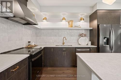 6973 Heathwoods Avenue, London South (South V), ON - Indoor Photo Showing Kitchen With Double Sink With Upgraded Kitchen