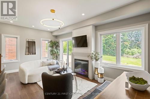 6973 Heathwoods Avenue, London South (South V), ON - Indoor Photo Showing Living Room With Fireplace