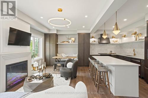 6973 Heathwoods Avenue, London South (South V), ON - Indoor With Fireplace