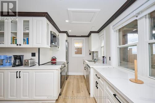 1033 Firelane 1 Road, Port Colborne (Sherkston), ON - Indoor Photo Showing Kitchen With Double Sink