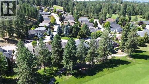 property is in the gap of trees in photo along fairway - 3897 Gallaghers Grange, Kelowna, BC - Outdoor With View