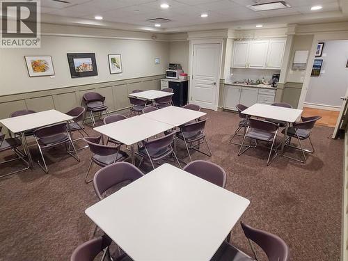 kitchen space for residents to book for family events - 3897 Gallaghers Grange, Kelowna, BC - Indoor Photo Showing Dining Room