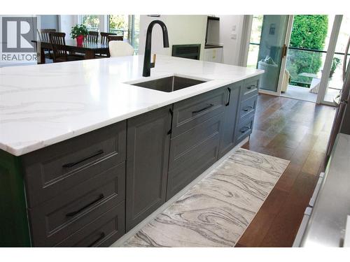 soft close drawers and cabinets along with hidden upper drawer inserts for extra storage - 3897 Gallaghers Grange, Kelowna, BC - Indoor Photo Showing Kitchen