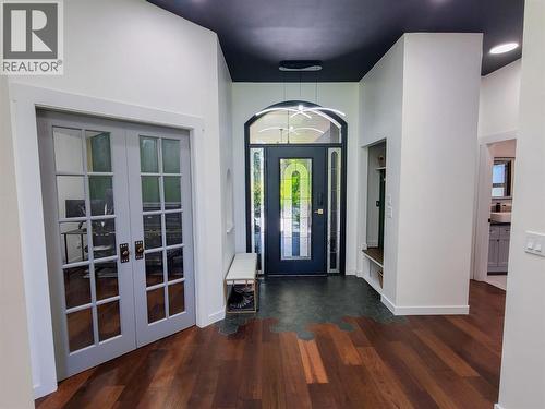 front entrance with office and hallway to guest bed - 3897 Gallaghers Grange, Kelowna, BC - Indoor Photo Showing Other Room