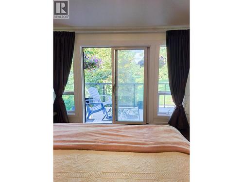 view of the course from master bedroom - 3897 Gallaghers Grange, Kelowna, BC - Indoor Photo Showing Bedroom